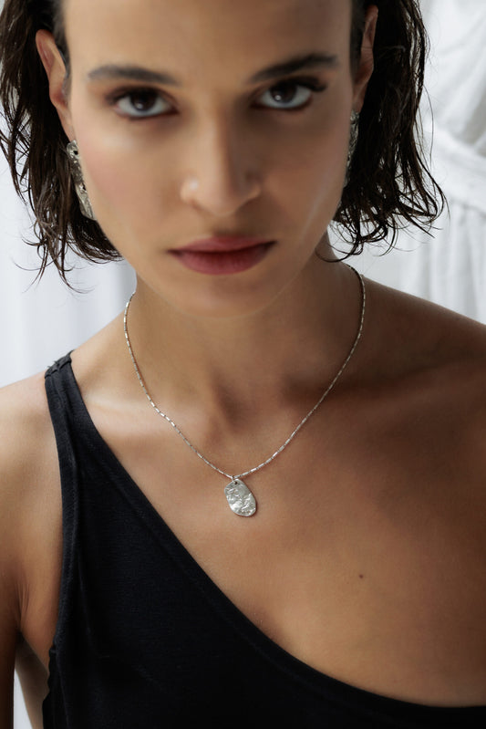 ANIW - The Face Necklace