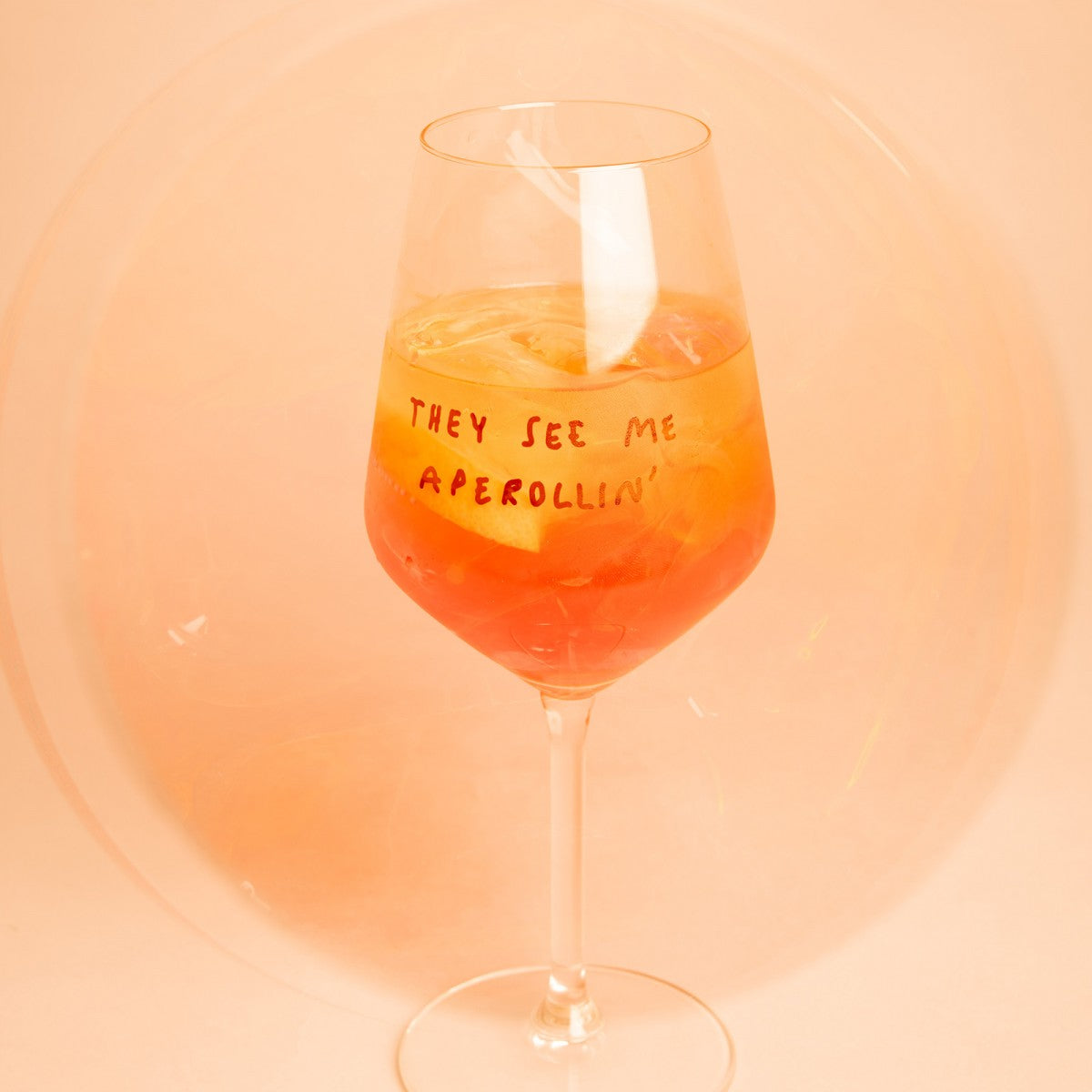 "They See Me Aperolin'" Wine Glass by Johanna Schwarzer × Selekkt