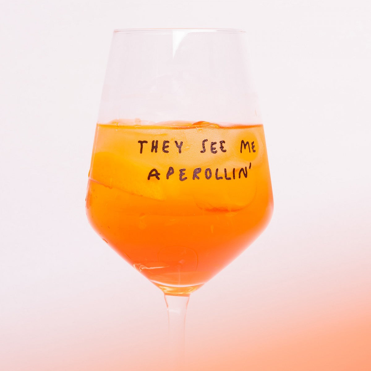 "They See Me Aperolin'" Wine Glass by Johanna Schwarzer × Selekkt