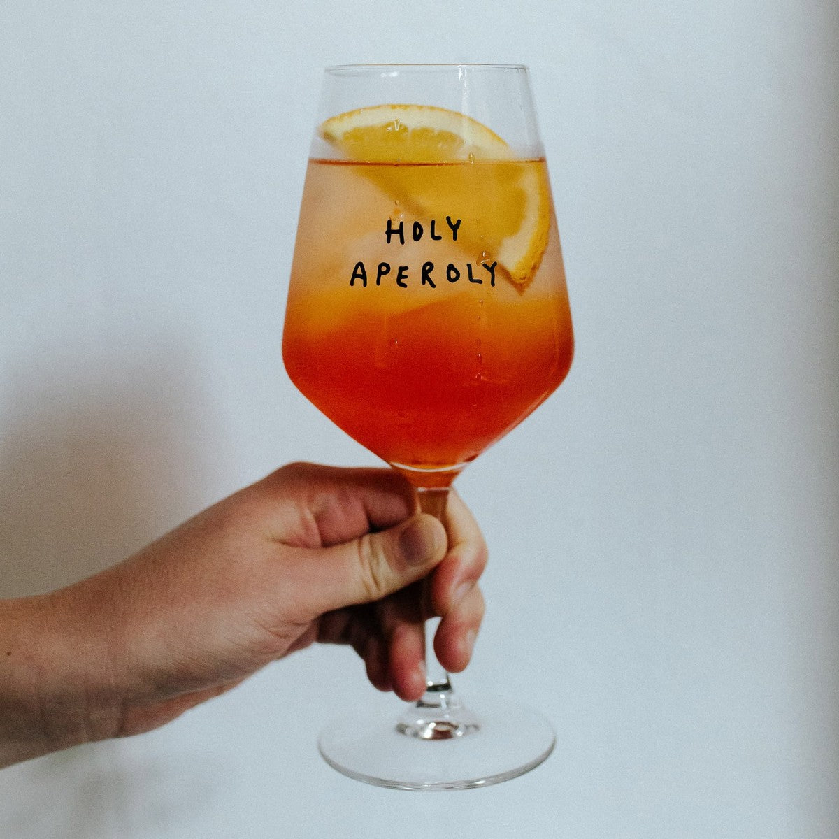 "Holy Aperoly" Wine Glass by Johanna Schwarzer × Selekkt